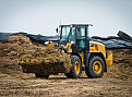 Малі колісні фронтальні навантажувачі CAT 914K – мініатюра