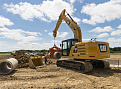 Середні гусеничні екскаватори CAT 323 – мініатюра