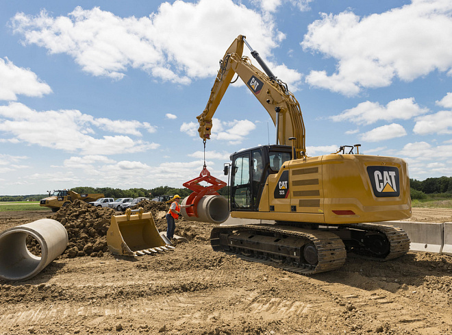 Середні гусеничні екскаватори CAT 323 – слайд