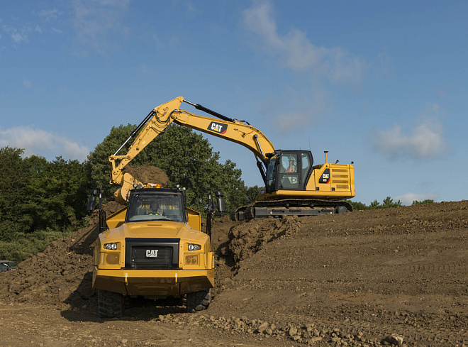 Середні гусеничні екскаватори CAT 323 – слайд