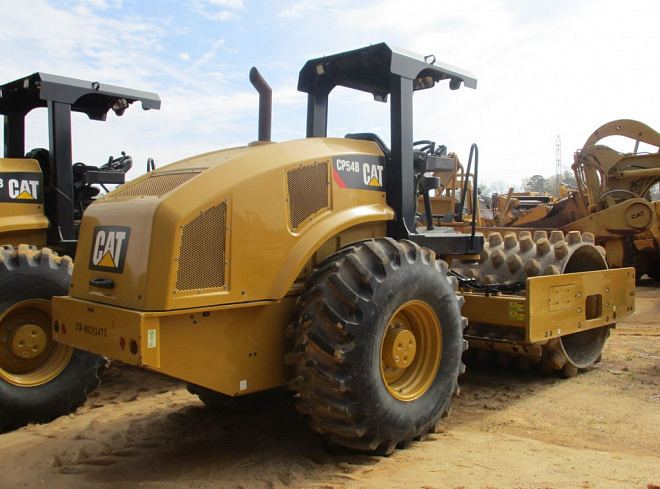 Одновальцеві ґрунтові котки CAT CP54B – слайд