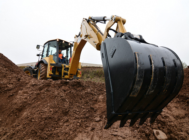Екскаватори-навантажувачі CAT 444 – слайд
