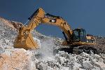 Нові вдосконалені екскаватори з довгим вильотом стріли від Caterpillar